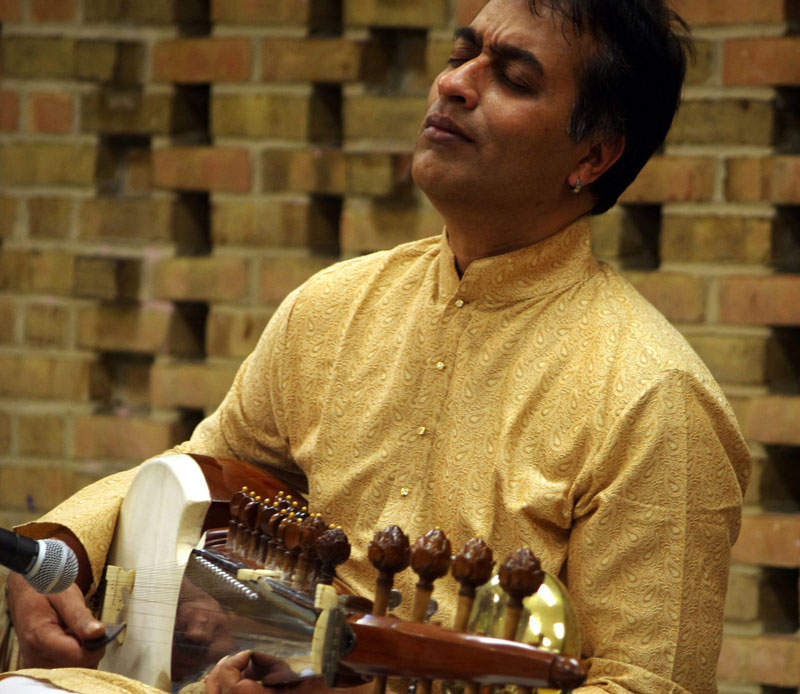 Dr. Rajeeb Chakraborty playing sarod