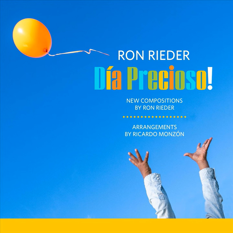 The cover of Día Precioso! by Ron Rieder features a blue sky and a single orange balloon floating upward. Below, two raised hands reach toward the balloon.