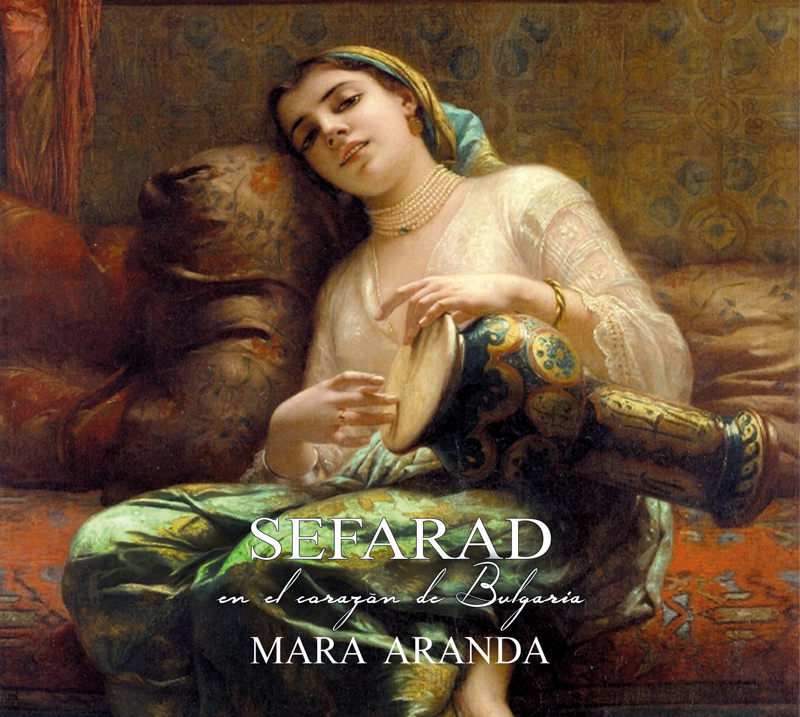 The album cover for Sefarad en el Corazón de Bulgaria by Mara Aranda features a classical-style painting of a young woman reclining on a richly decorated couch, dressed in traditional garments. She holds a darbuka (goblet drum) in her lap. The title and artist’s name are elegantly overlaid in white serif and cursive fonts.