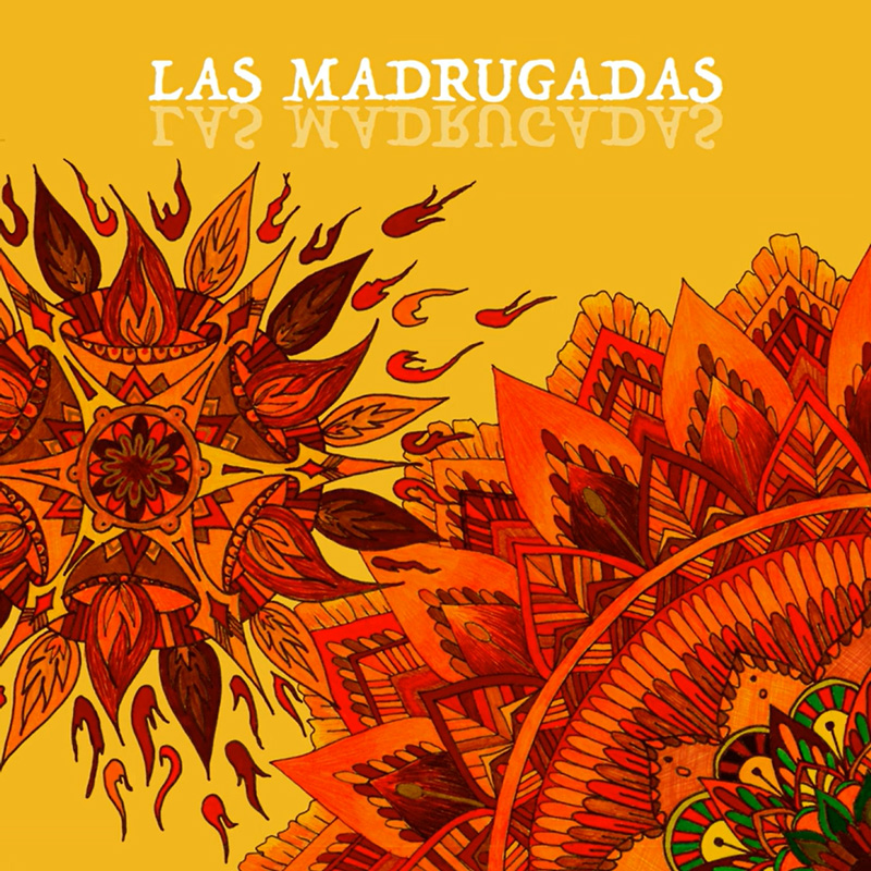 A cover dominated by golden yellow, orange, and deep red hues. Intricate mandala-like floral and geometric patterns radiate across the image, with stylized flames and leaf motifs.