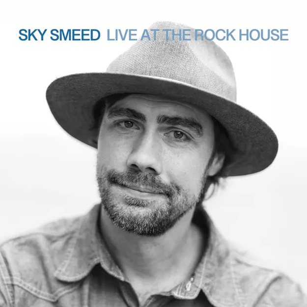 Sky Smeed - Live at the Rock House cover artwork. A black and white photo of Sky wearing a hat.