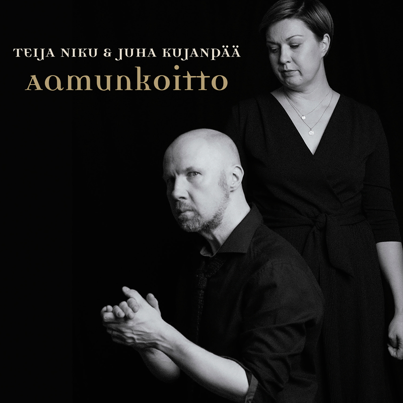Teija Niku & Juha Kujanpää: Aamunkoitto cover artwork. A black and white photo of the two artists.