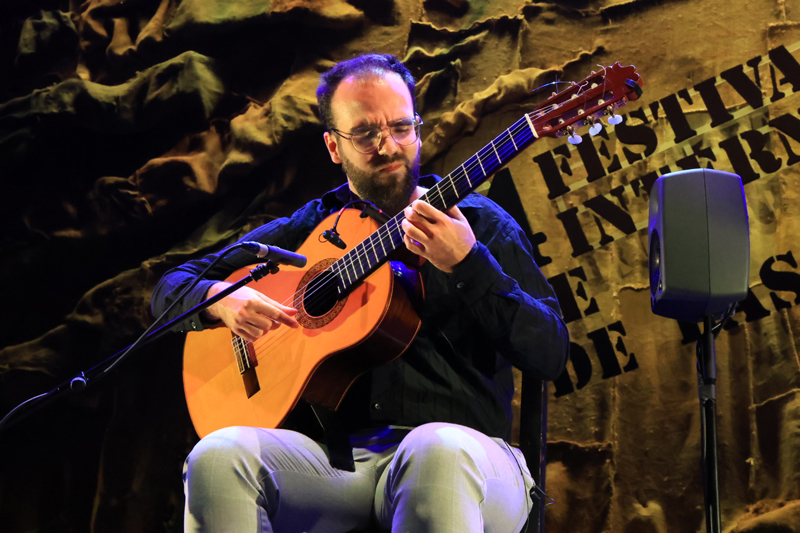 Toni Abellán Sánchez - Photo courtesy of International Festival of Cante de las Minas. Toni playing guitar.