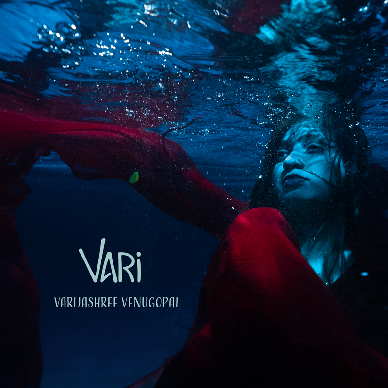 Varijashree Venugopal - VARI cover artwork. The singer swimming underwater.