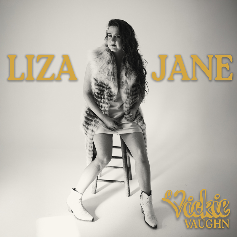 Vickie Vaughn - Liza Jane cover artwork. a photo of Vaughn sitting on a chair.