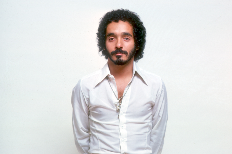 Willie Colón (courtesy of Craft Latino). Willie facing the camera with a beard and a white shirt.