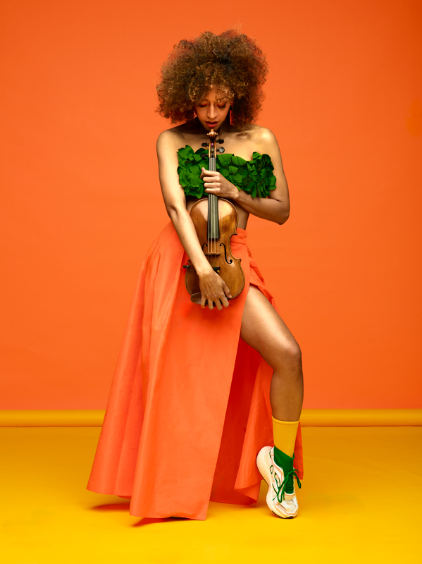 Yilian Cañizares - Photo by Franck Socha. Yilian holding her fiddle.
