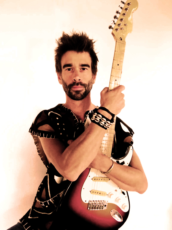 Yohann Le Ferrand holding an electric guitar