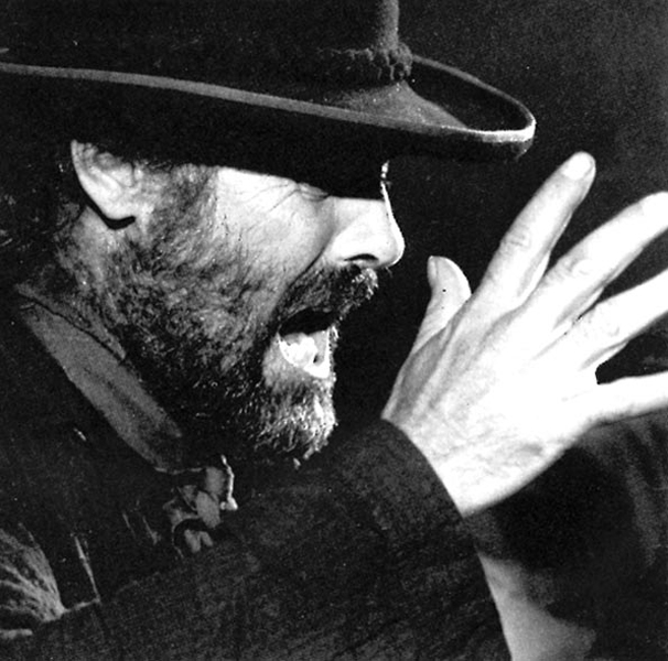 El Cabrero profile shot wearing a hat. Black and white.