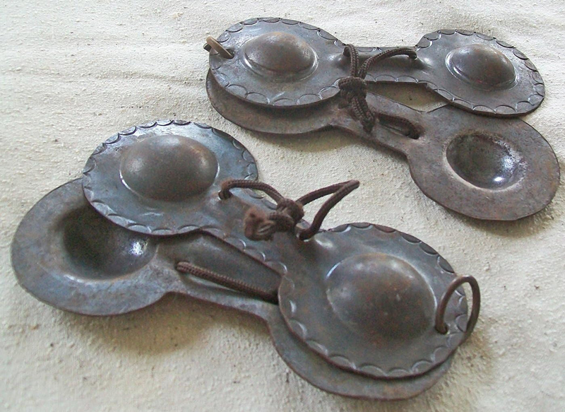 A pair of karkabas, fair trade. Metal castanets.